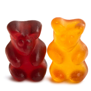 <Two gummy teddy bears sat next to each other representing personnel, one purple blackcurrant and the other orange. Credit> AdobeStock_305248957