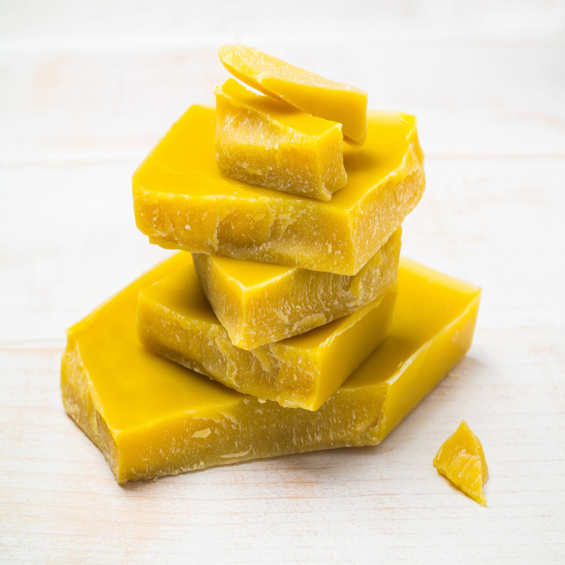 <Sample of smooth yellow blocks of Cocoa Butter on a lab worktop awaiting melting point testing. Credit> AdobeStock_321300508