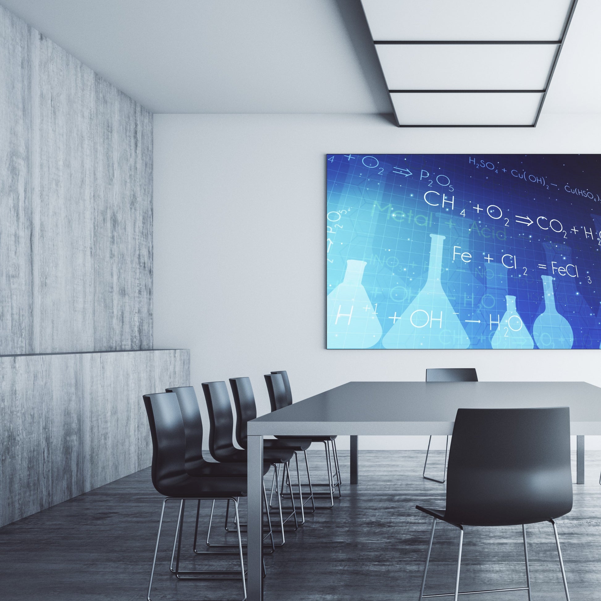 <Futuristic laboratory meeting room with plain grey table, seven plastic black chairs with chrome legs, shiny grey stone effect floor and wall, and a large blue screen with light blue images of flasks and chemical equations. Credit> AdobeStock_694390582