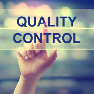 <Hand with outstretched finger selecting Quality Control written in blue on a virtual screen, with blurred futuristic background. Credit> AdobeStock_93797744