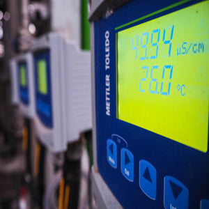 <A row of the digital displays of in-line conductivity meters on a purified water plant the nearest one reading 49.94uS/cm and a temperature of 26.0 degrees C. Credit> 1106503172 by Engineer Story @ Shutterstock